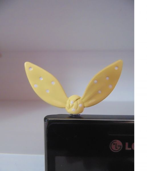 Plug para celular - Laço amarelo de poá